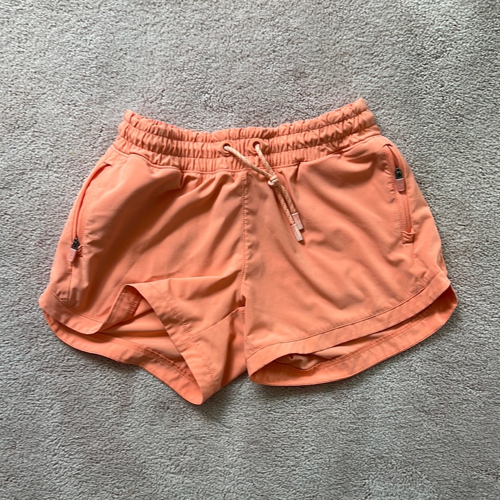 peach/coral girls athleta shorts size 12